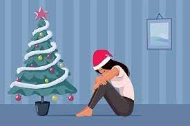 A person overwhelmed with holiday tasks symbolizing why waiting for the right time to start resolutions is important.