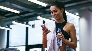 An athlete putting away their phone before training, symbolizing the benefits of focus and mental clarity for improving workout performance.